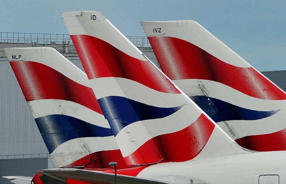 British Airways logos are seen on tailfins at Heathrow Airport in London. ― Reuters file pic