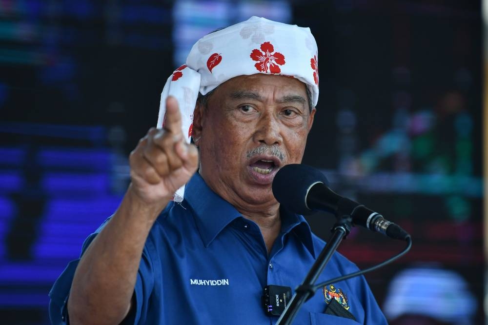 Tan Sri Muhyiddin Yassing at the Fishermen Complex in Chendering, Terengganum July 30, 2022. — Bernama pic