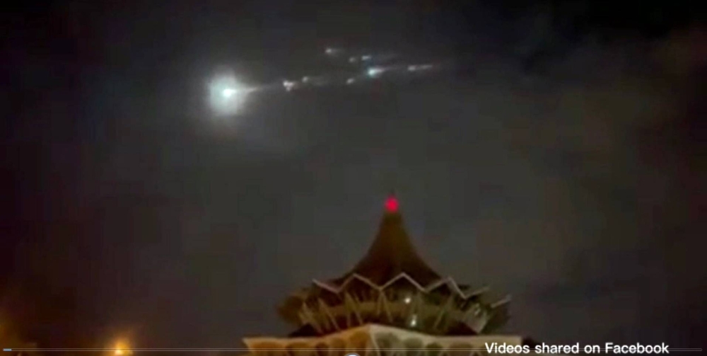 Several bright objects, suspected to be a Chinese rocket debris that had fallen back to earth, were seen streaking across the night sky in Kuching last night. — Facebook pic via Borneo Post