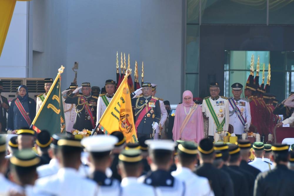 Yang di-Pertuan Agong Al-Sultan Abdullah Ri’ayatuddin Al-Mustafa Billah Shah and Raja Permaisuri Agong Tunku Hajah Azizah Aminah Maimunah Iskandariah at the Warriors’ Day 2022 parade at Dataran Pahlawan Negara. — Bernama pic