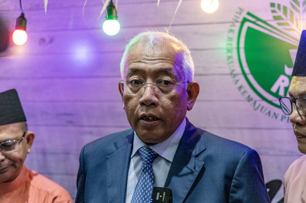 Rural Development Minister Datuk Seri Mahdzir Khalid speaks during a press conference at Risda Hari Raya Aidilfitri celebration in Jalan Ampang May 30, 2022. — Picture by Firdaus Latif  