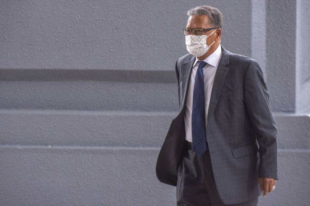 Tan Sri Mohamed Apandi Ali is pictured at the Kuala Lumpur High Court May 23, 2022. — Picture by Shafwan Zaidon