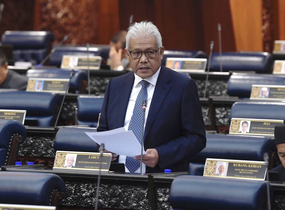 Datuk Seri Hamzah Zainudin addresses members of Parliament in Kuala Lumpur August 2, 2022. — Bernama pic