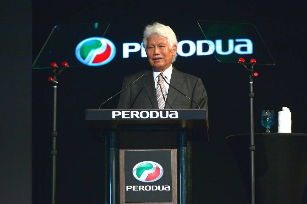 Perodua president and CEO Datuk Zainal Abidin Ahmad delivers his speech during the official launch of Perodua's new Alza at the Kuala Lumpur Convention Centre July 20, 2022. — Picture by Shafwan Zaidon