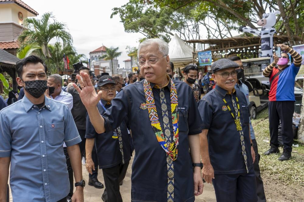 Prime Minister Datuk Seri Ismail Sabri (centre) during the launch of the Malaysian Agriculture, Horticulture, and Agrotourism exhibition in Serdang August 6, 2022. — Picture by Shafwan Zaidon