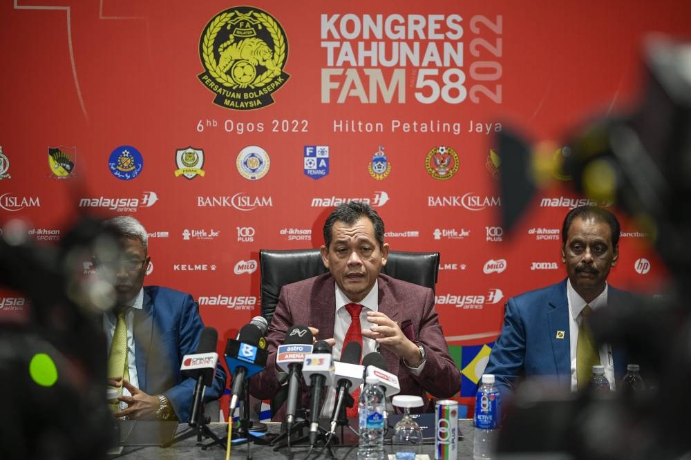 Football Association of Malaysia (FAM) President Datuk Hamidin Mohd Amin (centre) at a press conference after the 58th FAM Annual Congress, Petaling Jaya, August 6, 2022. — Bernama pic