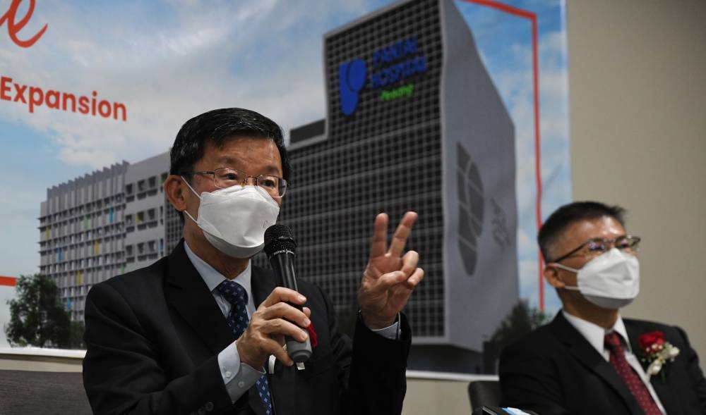 Penang Chief Minister Chow Kon Yeow (left) speaks during a press conference after the Pantai Hospital ground breaking ceremony in Bayan Baru, George Town August 6, 2022. — Bernama pic