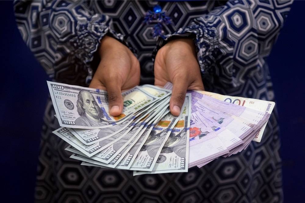 The ringgit has depreciated sharply against the greenback in 2022, declining by about 6.7 per cent year-to-date to a four-year low of RM4.45.. ― Bernama pic