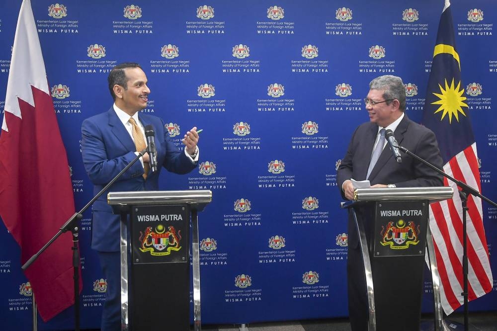 Foreign Minister Datuk Seri Saifuddin Abdullah and Qatar’s Deputy Prime Minister who is also the Foreign Affairs Minister Sheikh Mohammed bin Abdulrahman Al-Thani during a press conference at Wisma Putra, Putrajaya, August 12, 2022. — Bernama pic 