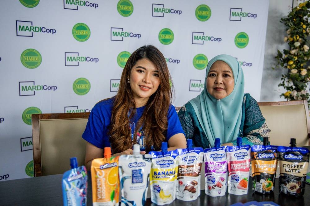 Origina CEO Fatin Dian and General Manager Adillah Shuib with some of their products. — Picture by Firdaus Latif