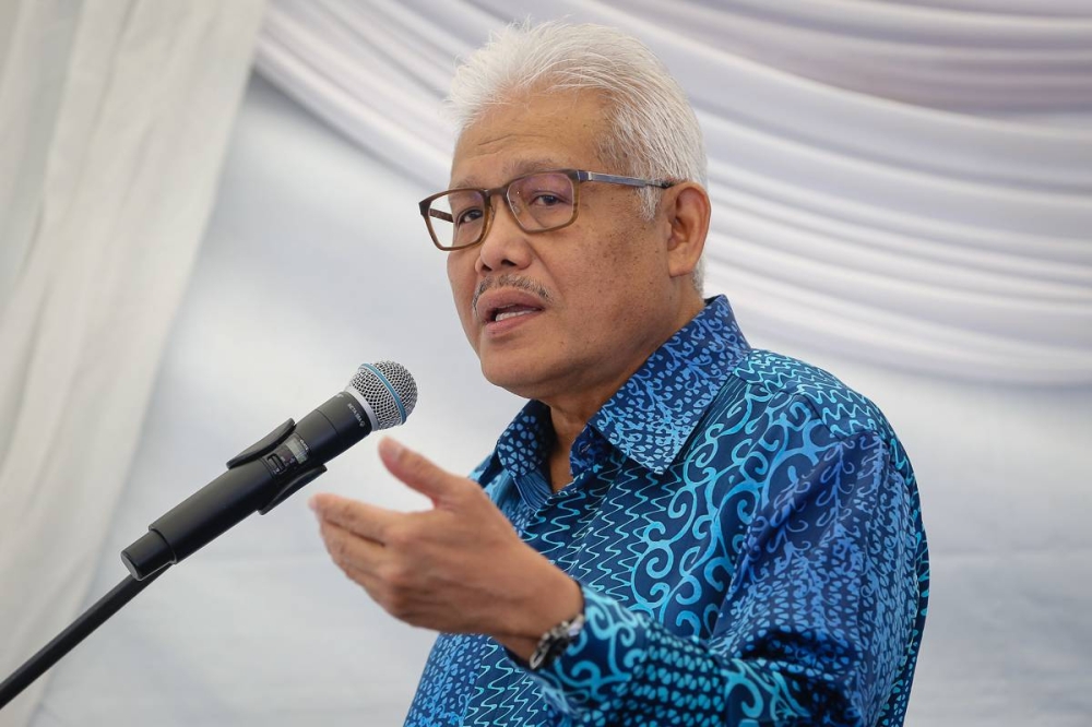 Home Minister Datuk Seri Hamzah Zainudin delivers a speech during an anti-human trafficking event  in Damansara August 4, 2022. — Picture by Yusof Mat Isa