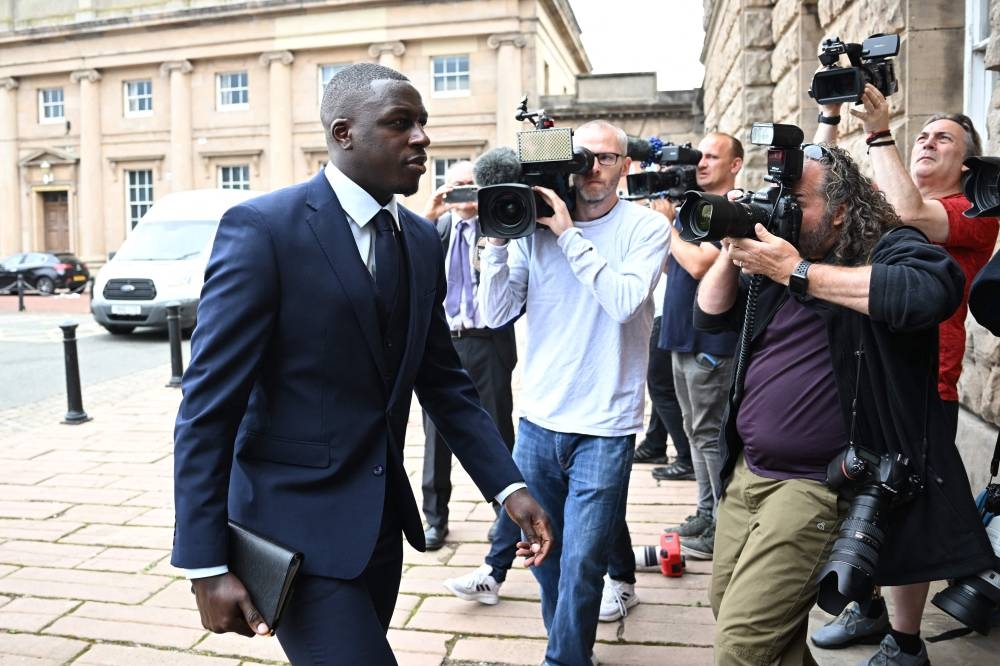 Manchester City and France footballer Benjamin Mendy arrives to Chester Crown Court in north-west England August 15, 2022 for his trial for the alleged rape and assault of seven women. — AFP pic 