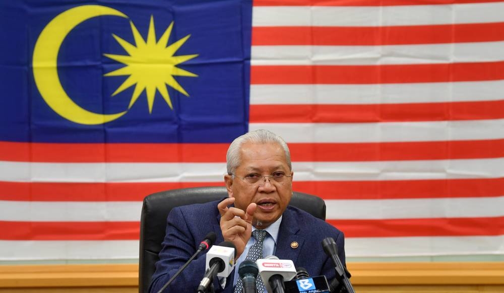 Communications and Multimedia Minister Tan Sri Annuar Musa speaks during a press conference in Putrajaya August 17, 2022. — Bernama pic