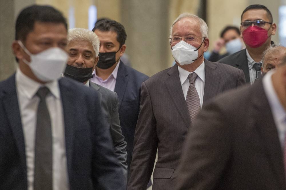 Datuk Seri Najib Razak arrives at the Palace of Justice in Putrajaya August 18, 2022. — Picture by Shafwan Zaidon