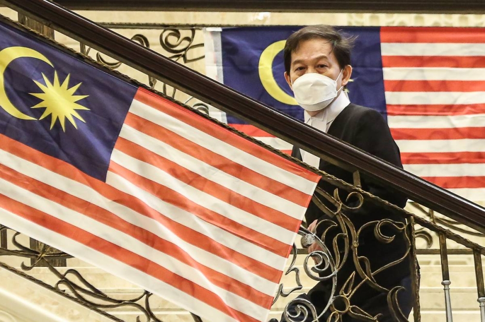 Lawyer Hisyam Teh Poh Teik arrives at the Palace of Justice in Putrajaya August 15, 2022. — Picture by Yusof Mat Isa