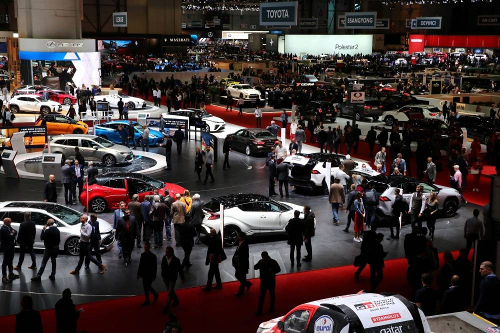 Visitors are pictured at the 89th Geneva International Motor Show in Geneva, Switzerland March 6, 2019. — Reuters pic