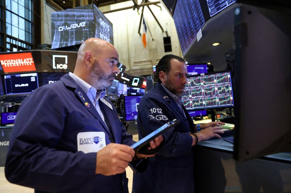 After slumping through the first half of 2022 amid concerns over central bank tightening, stocks have done better since the end of June as investors bet on a pivot by the Federal Reserve some time in the near future. — Reuters pic