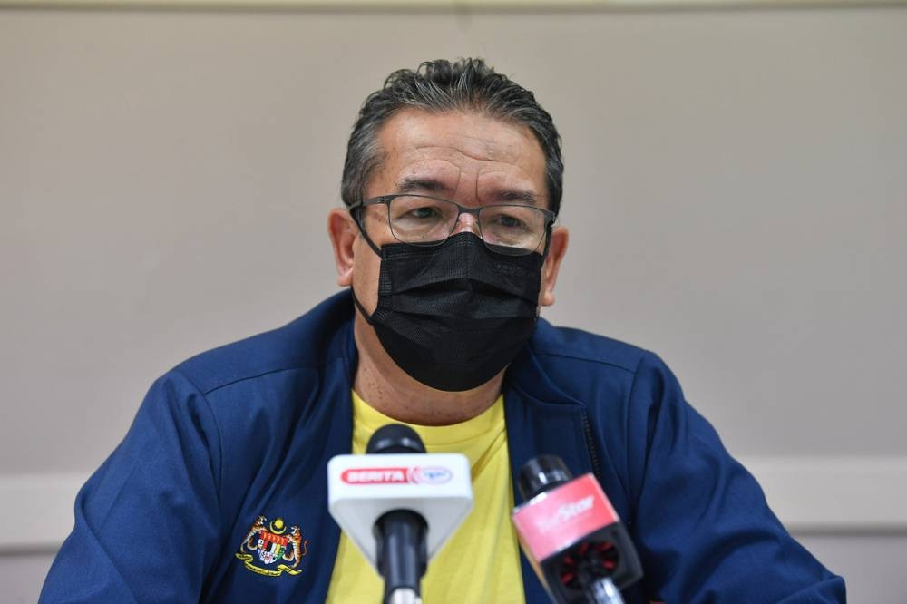 Minister in the Prime Minister’s Department (Special Functions) Datuk Dr Abd Latiff Ahmad speaks during a press conference in Putrajaya December 20, 2021. — Bernama pic