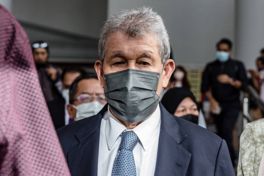 Former Boustead Heavy Industries Corp Bhd (BHIC) managing director Tan Sri Ahmad Ramli Mohd Nor is pictured at the Kuala Lumpur Court Complex August 16, 2022. — Picture by Firdaus Latif