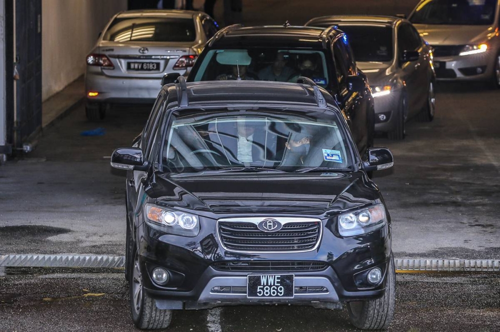 Vehicle ferrying former prime minister Datuk Seri Najib Razak is seen leaving the Federal Court in Putrajaya, August 23, 2022. Reactions to the verdict on social media have been slim to none, with only Umno secretary-general Datuk Seri Ahmad Maslan so far commenting on the judgment. — Picture by Yusof Mat Isa