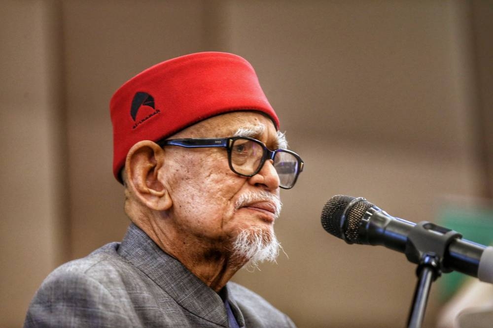 PAS president Datuk Seri Abdul Hadi Awang delivers a speech at the Everly Hotel in Putrajaya July 17, 2022. — Picture by Ahmad Zamzahuri