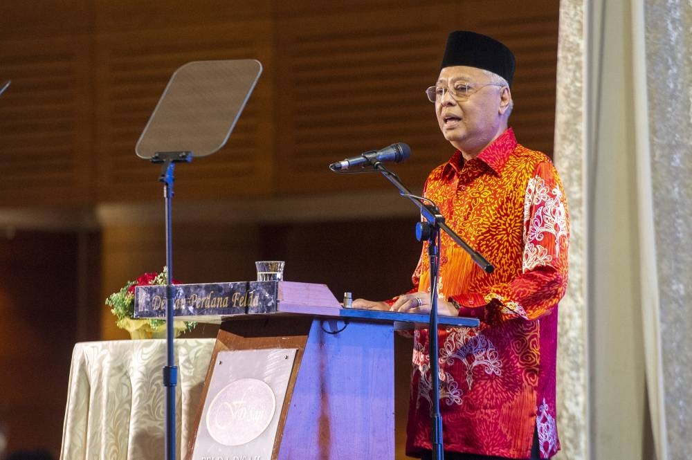 Prime Minister Datuk Seri Ismail Sabri delivers his speech during the 60th Women's Day celebration in Kuala Lumpur August 25, 2022. — Picture by Shafwan Zaidon