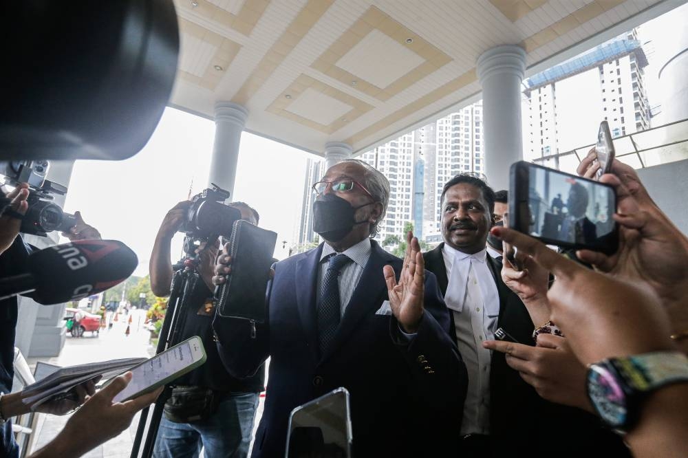 Yesterday afternoon when met by reporters at the Kuala Lumpur court complex, lawyer Tan Sri Muhammad Shafee Abdullah also refused to provide an answer on how Datuk Seri Najib Razak was doing after having spent two nights in prison. — Picture by Sayuti Zainudin 