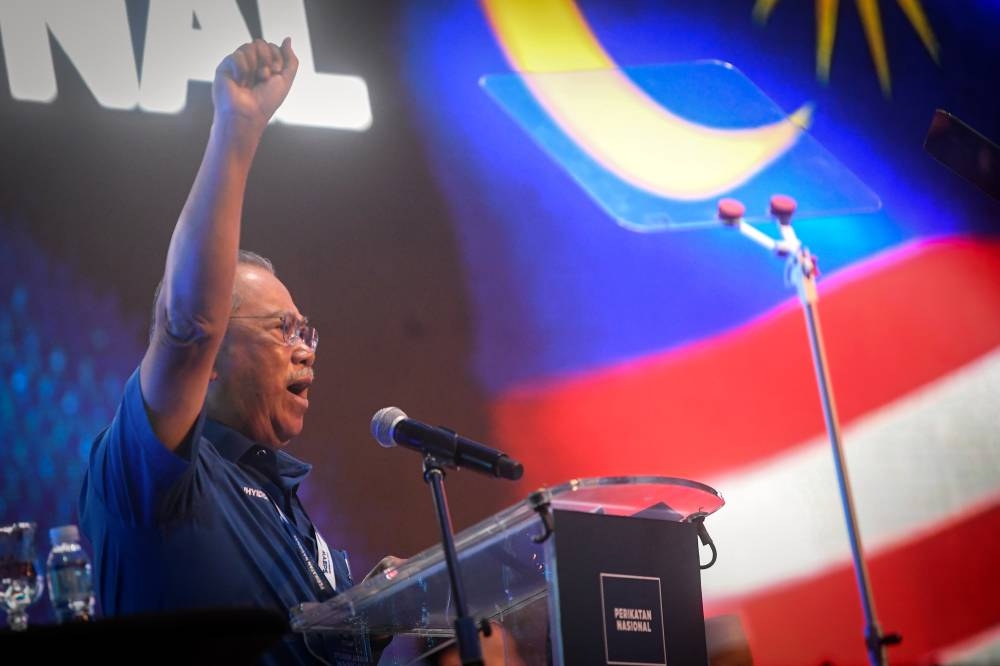 Perikatan Nasional (PN) Chairman Tan Sri Muhyiddin Yassin addressing the 2022 PN Convention at the Malaysian Agricultural Expo Park (MAEPS) in Serdang, August 27. — Bernama pic