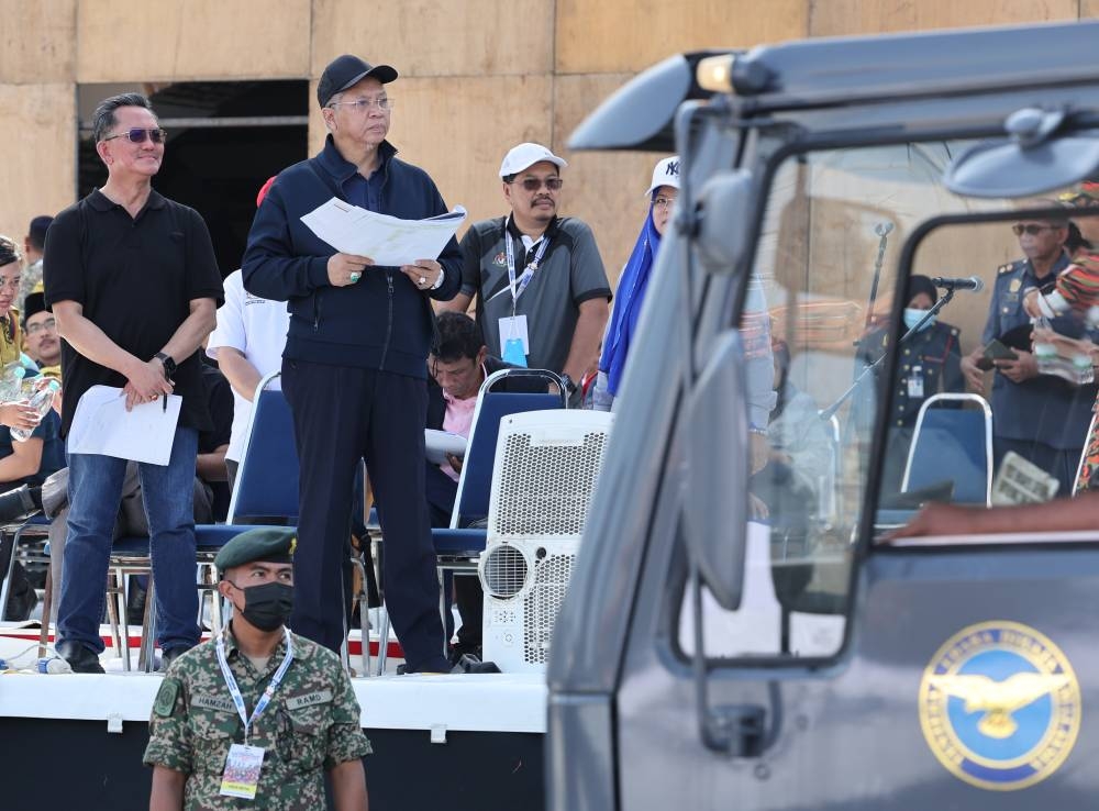 Minister of Communications and Multimedia who is also the chairman of the National Day and Malaysia Day 2022 main committee, Tan Sri Annuar Musa (second right) attends the National Day 2022 celebration parade at Dataran Merdeka, Kuala Lumpur, August 27, 2022. — Bernama pic