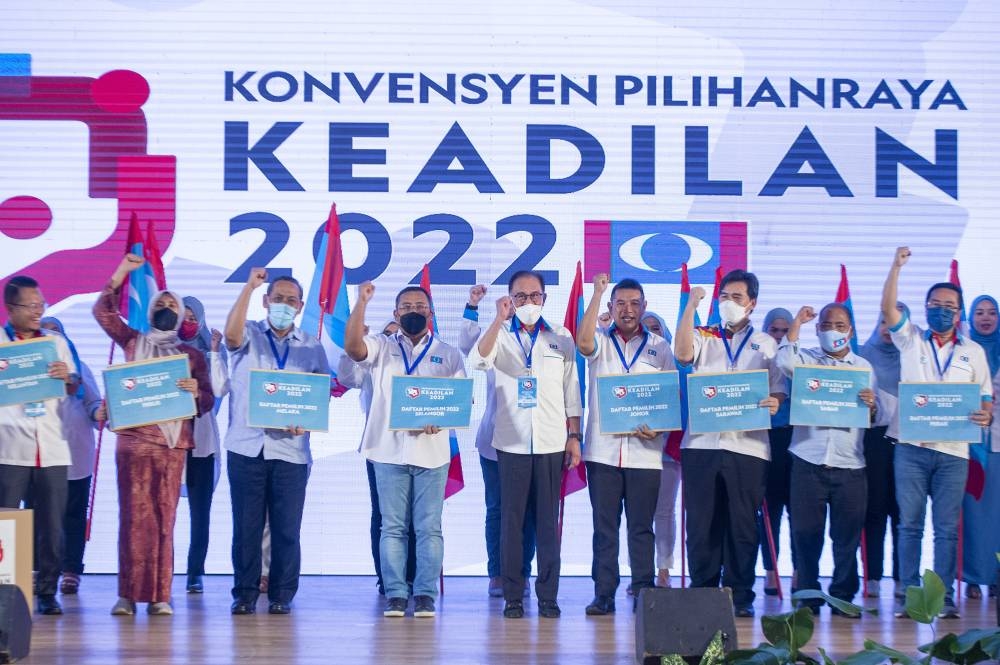 PKR president, Anwar Ibrahim together with PKR state election commander take a group photo during the PKR Election Convention in Shah Alam on 27 August 2022. — Picture by Shafwan Zaidon