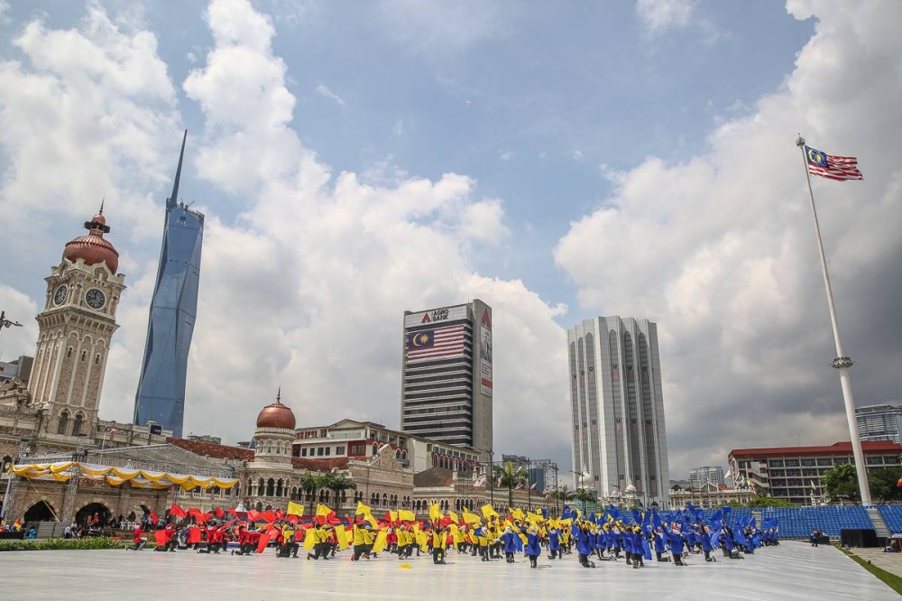 Students take part in the rehearsal for the 65th National Day celebrations at Dataran Merdeka in Kuala Lumpur August 25, 2022. — Picture by Yusof Mat Isa