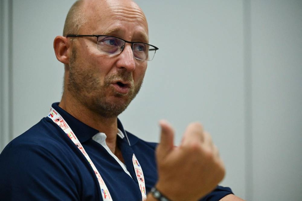 Badminton World Federation secretary general Thomas Lund speaks during an interview with AFP on the sidelines of the Badminton World Championships in Tokyo August 23, 2022. — AFP pic