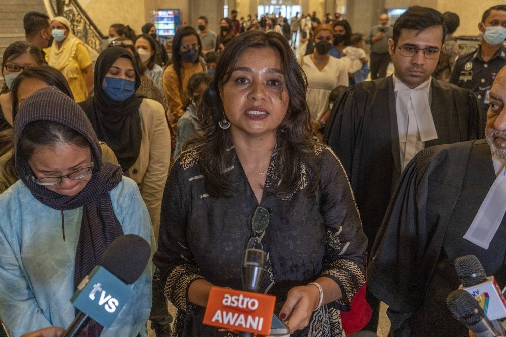 Family Frontiers president Suriani Kempe speaks to the media during after court of appeal decision on citizenship certificates at Palace of Justice in Putrajaya August 5, 2022. — Picture by Shafwan Zaidon