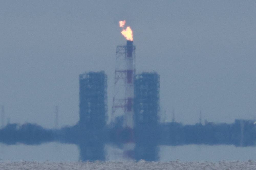 A view shows a gas flare at Portovaya Bay on the coast of the Gulf of Finland in the Leningrad Region, Russia August 26, 2022. — Reuters pic