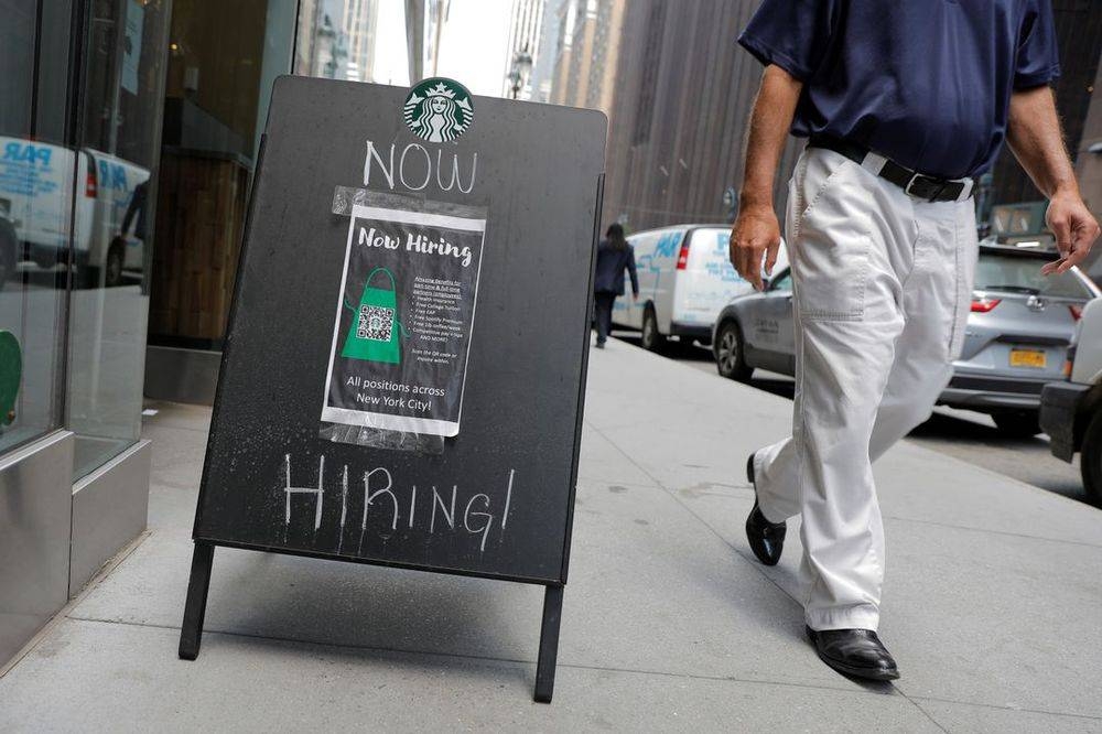 A sign advertising job openings is seen outside of a Starbucks in Manhattan, New York City, New York, US, May 26, 2021. — Reuters pic