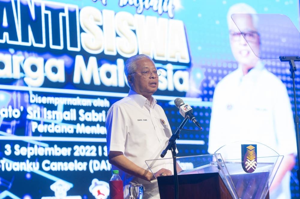 Prime Minister Datuk Seri Ismail Sabri Yaakob delivering his speech during the launching of the Peranti Siswa Keluarga Malaysia initiative at Dewan Agung Tuanku Canselor, UiTM Shah Alam, 3 September 2022. — Picture by Shafwan Zaidon