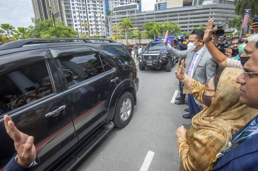 File picture shows former prime minister's wife, Datin Rosmah Mansor waving to the prison convoy bringing Najib from the Kuala Lumpur high court on 26 August 2022. — Picture by Shafwan Zaidon