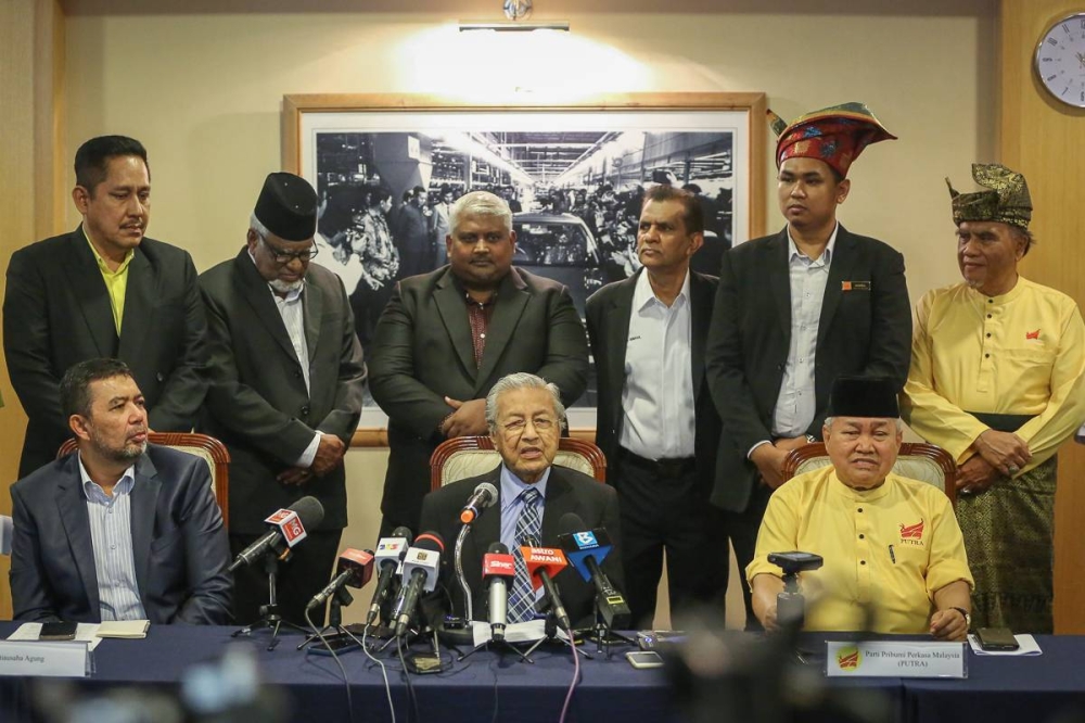 Marzuki said that the party’s chairman Tun Dr Mahathir Mohamad (centre, seated) will be GTA chairman, while four other party presidents will serve as deputy chairmen. — Picture by Yusof Mat Isa