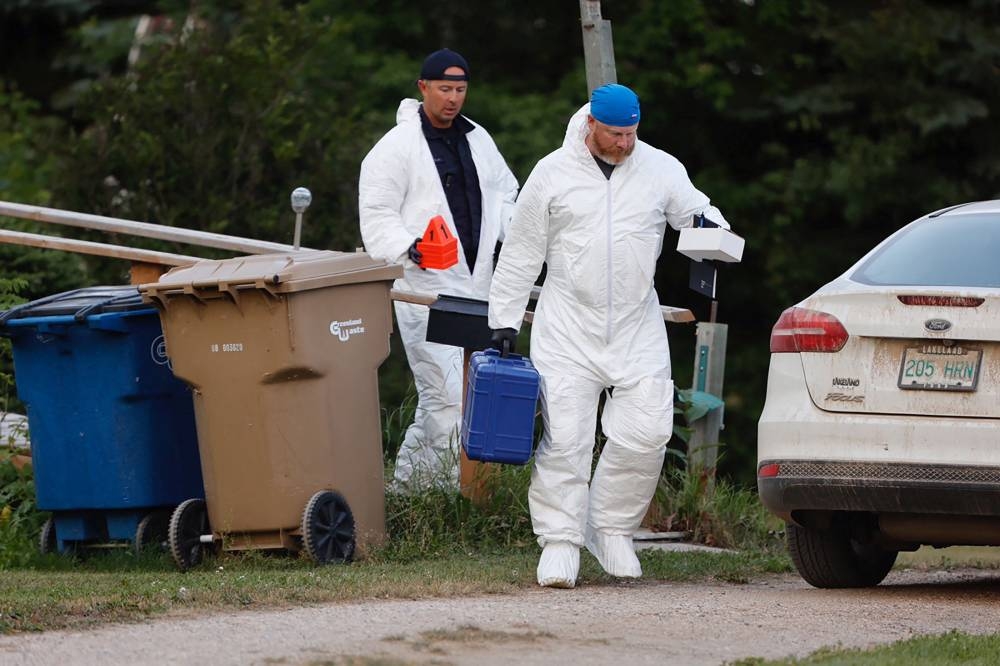 A police forensics team investigates a crime scene after multiple people were killed and injured in a stabbing spree in Weldon, Saskatchewan, Canada September 4, 2022. ― Reuters pic