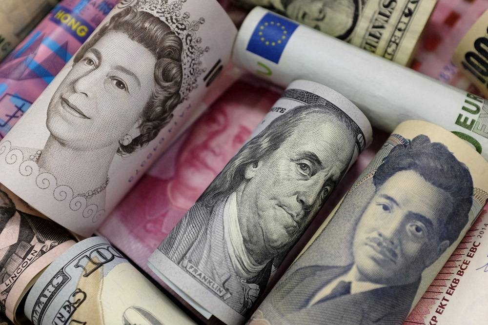 Against sterling, the greenback hit US$1.1407 (RM5.13), the lowest since 1985 and last down 0.1 per cent at US$1.1509. — Reuters pic