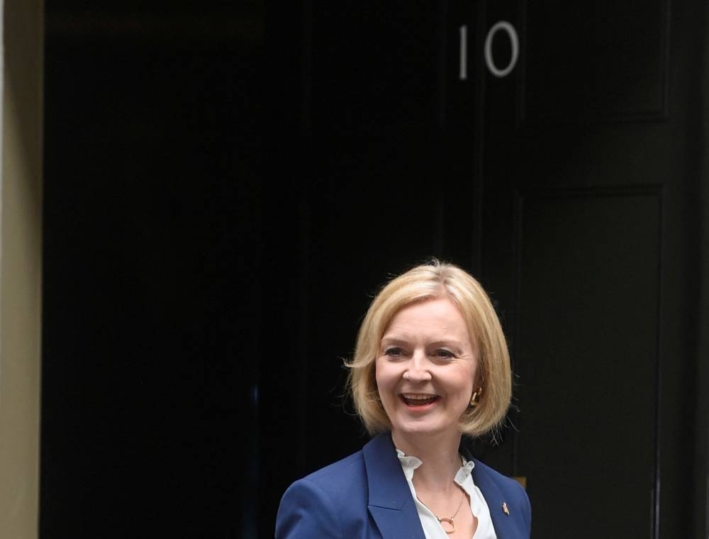 New British Prime Minister Liz Truss walks outside Number 10 Downing Street, in London, Britain September 7, 2022. ― Reuters pic