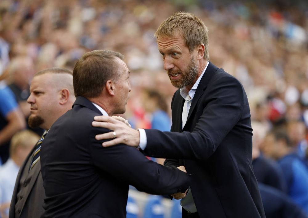 Brighton & Hove Albion manager Graham Potter (right) with Leicester City manager Brendan Rodgers before the match at The American Express Community Stadium, Brighton September 4, 2022. — Reuters pic