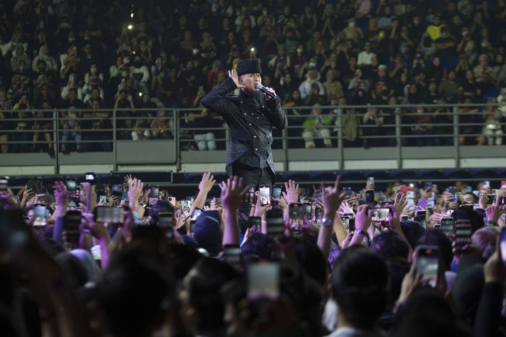 Dewa 19 keyboardist and leader, Ahmad Dhani was in high spirits as he missed Dewa 19's 2019 show in Melawati Stadium, Shah Alam. — Picture by Shafwan Zaidon. 