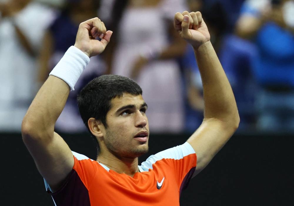 Spain’s Carlos Alcaraz celebrates winning his semi-final match against Frances Tiafoe of the US at the US Open match in Flushing Meadows, New York, September 9, 2022. ― Reuters pic