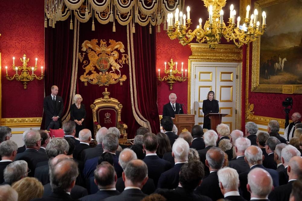 Britain’s William, Prince of Wales, Queen Camilla, King Charles III and Lord President of the Council Penny Mordaunt stand before Privy Council members in the Throne Room during the Accession Council at St James’s Palace, where King Charles is formally proclaimed Britain's new monarch, following the death of Queen Elizabeth II, in London, Britain September 10, 2022. ― Reuters pic