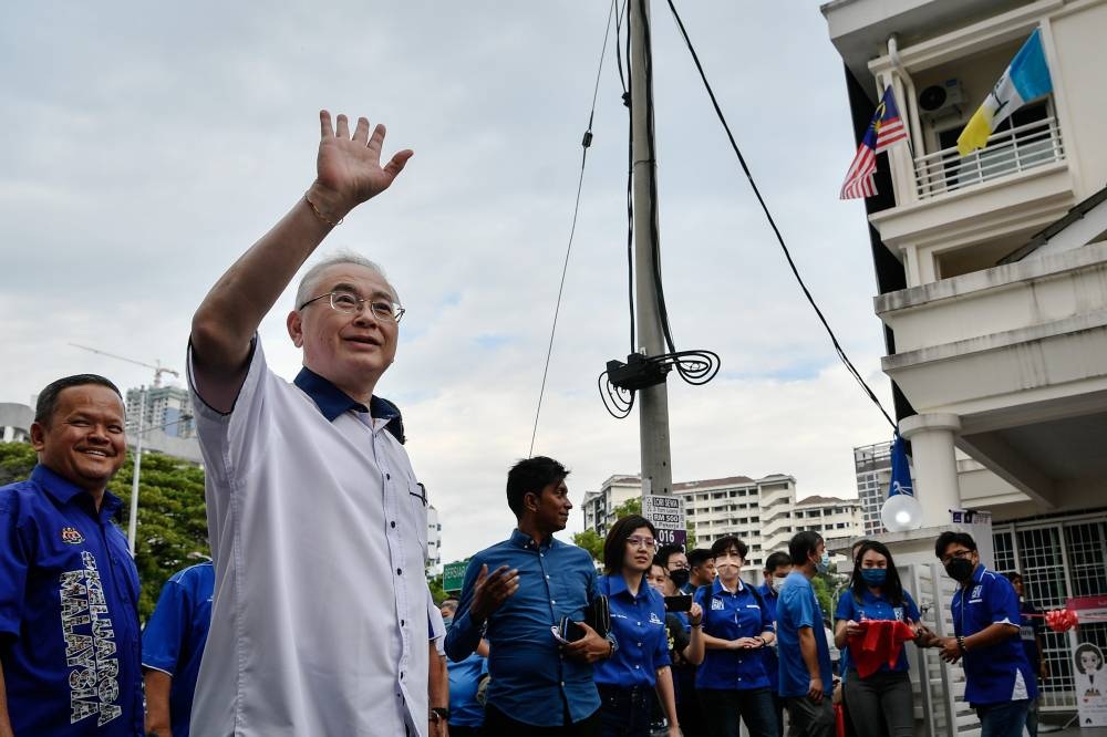 Minister of Transport Datuk Seri Dr Wee Ka Siong waves to the crowd during his visit to Penang, September 10, 2022. ― Bernama pic