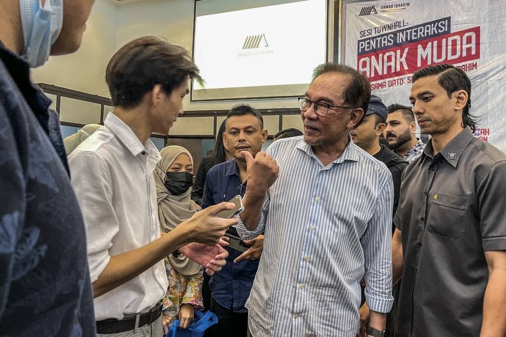 Opposition Leader Datuk Seri Anwar Ibrahim attends the town hall session with youths at Universiti Malaya Alumni Centre September 11, 2022. — Picture by Hari Anggara