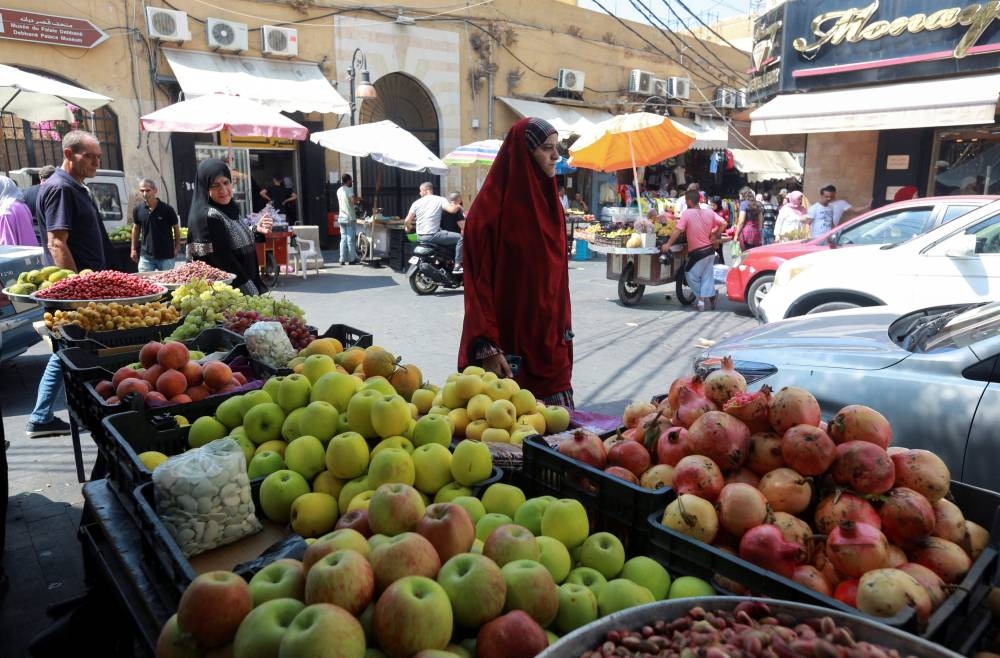 A woman walks at a market in the southern Lebanese city of Sidon, Lebanon September 6, 2022. — Reuters pic