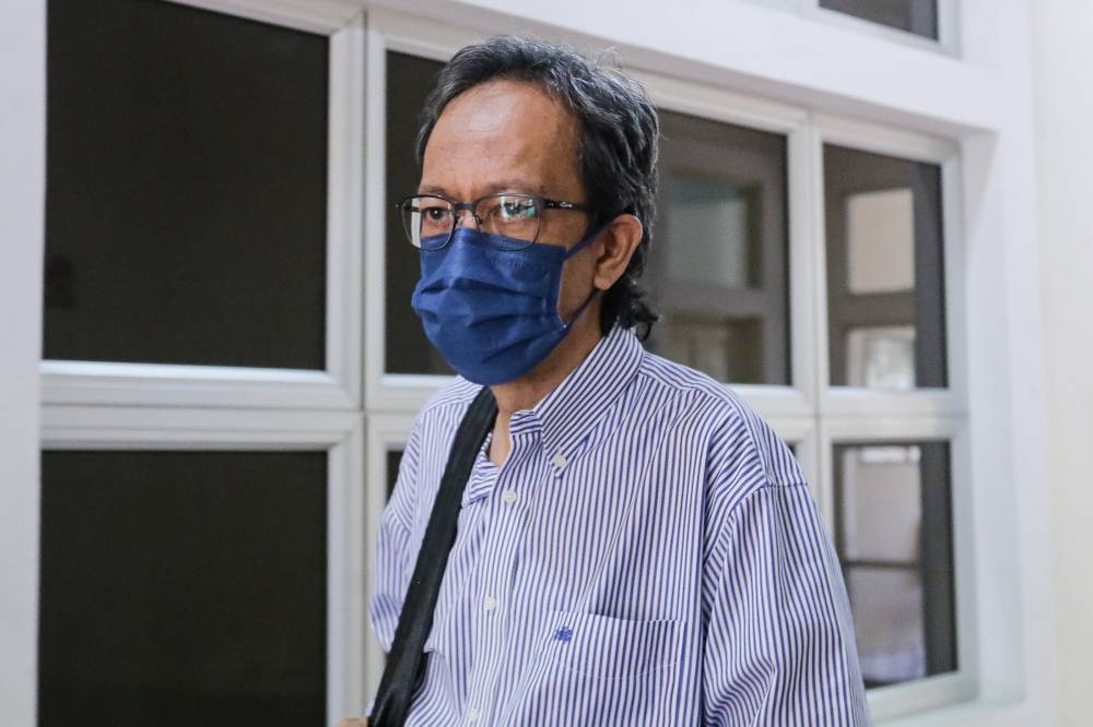 Azam Aris, former editor-in-chief of The Edge, is pictured at the Petaling Jaya Magistrate's Court September 13, 2022. — Picture by Sayuti Zainudin