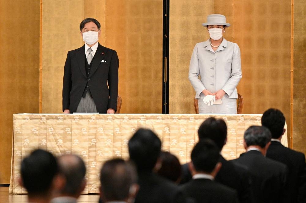 According to the Japanese government, Emperor Naruhito and Empress Masako will attend Queen Elizabeth II's funeral. ― AFP pic